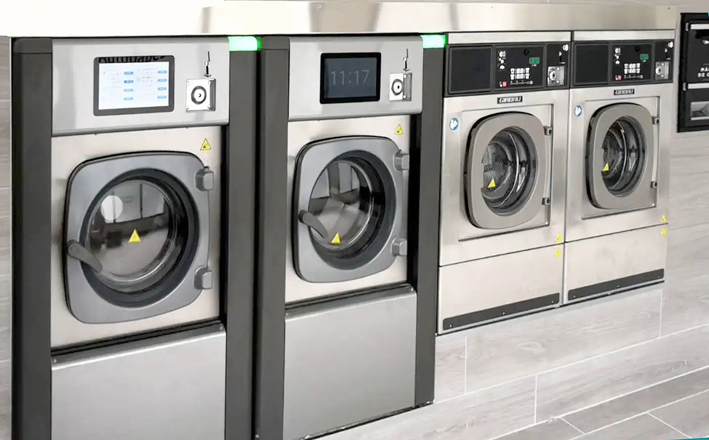 Girbau self-service laundry machines connected to Sapphire Laundry Pay for real-time monitoring, payments, and customer management.