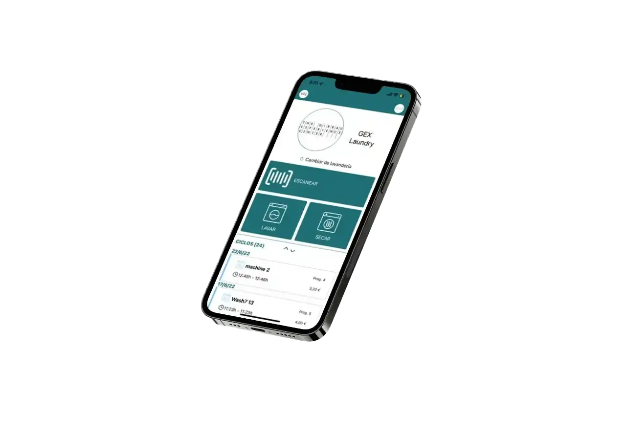 Aplicativo Girbau Sapphire exibido em um smartphone para gerenciar pagamentos, monitorar máquinas e operar lavanderias de autosserviço.