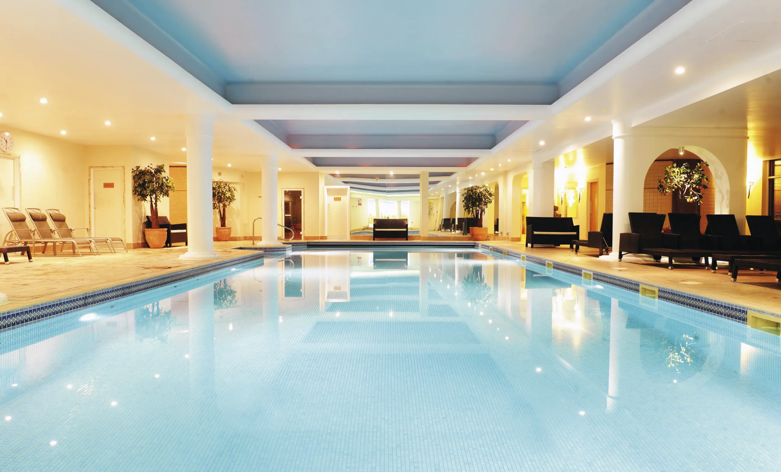 Indoor swimming pool and spa area at Stoke by Nayland Hotel, Golf & Spa designed for a premium wellness experience.
